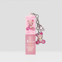 Cargar imagen en el visor de la galería, ACEITE LABIAL DONUTELLA TOKIDOKI X BEAUTY CREATIONS