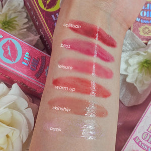 LIP OIL MASSAGE TINTED & PLUMPING LIP OIL RUDE COSMETICS